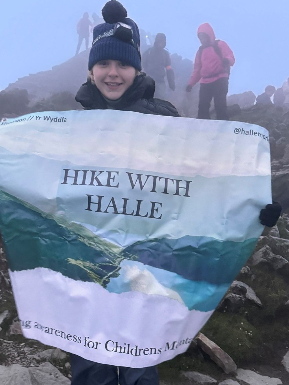 Halle with a banner that says 'hike with Halle'